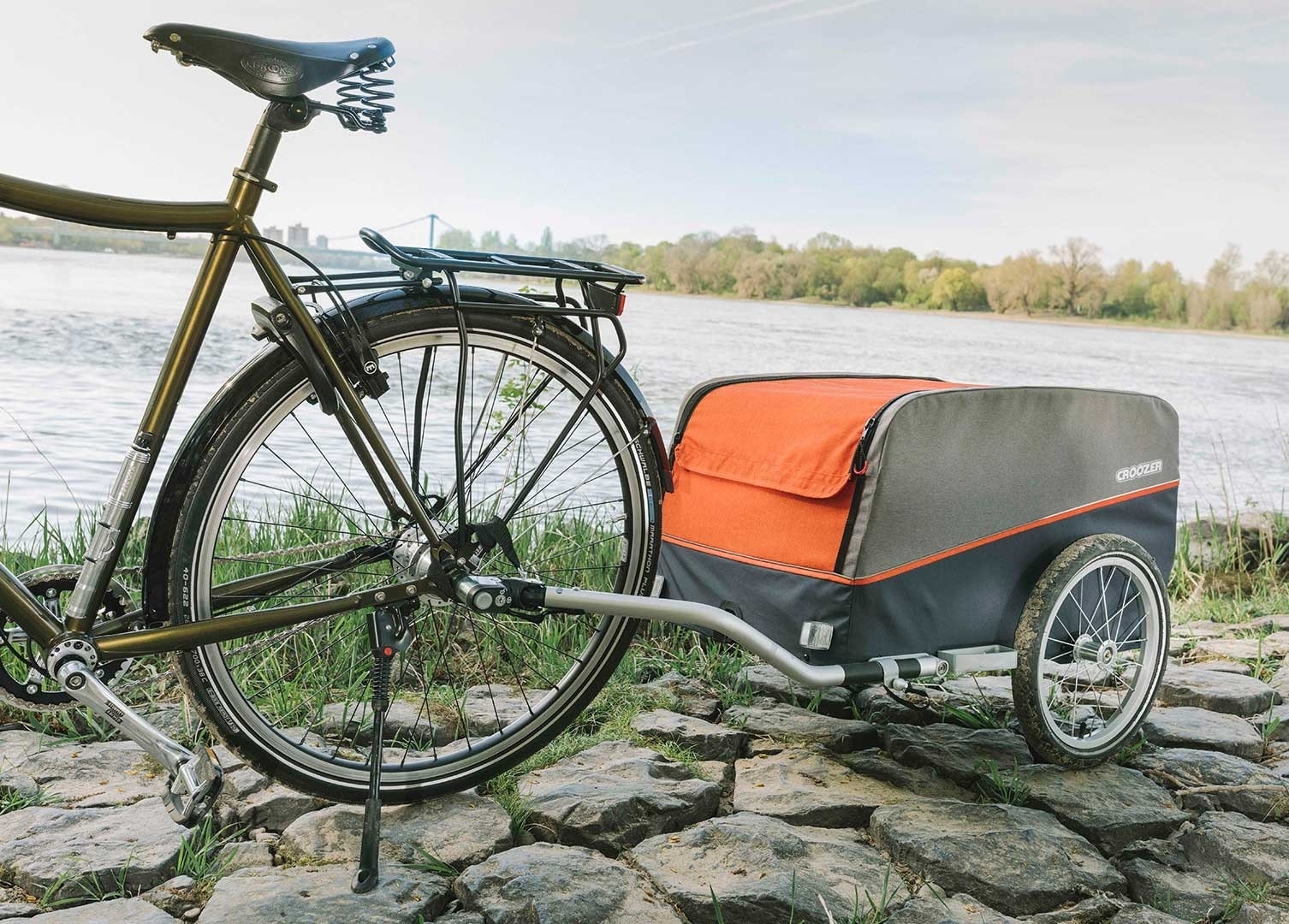 Entdecke den Croozer Cargo AnhĂ€nger â ideal fĂŒr Camping, EinkĂ€ufe & Picknick. Einfach am Fahrrad anhĂ€ngen und komfo